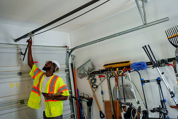 Professional Garage Door Panel Replacement technician working in Adams County County, IN
